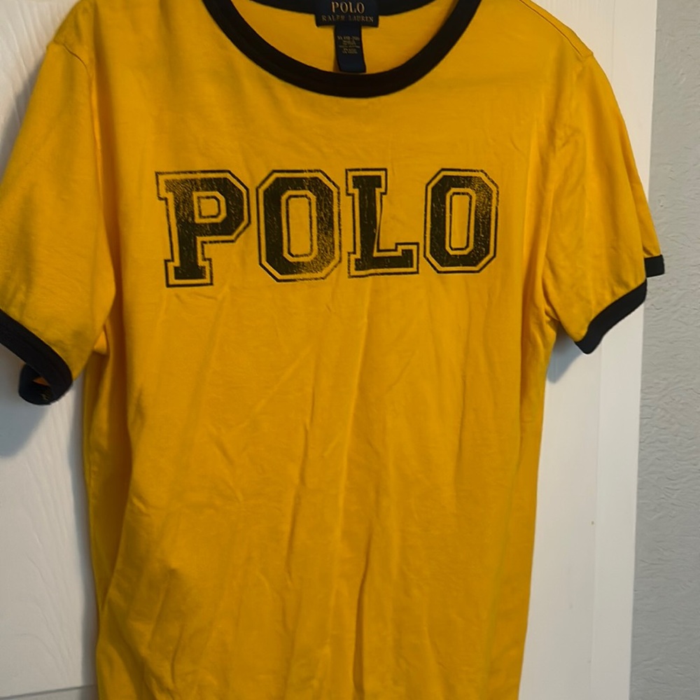 Short sleeve tee good condition graphics on both sides (fits size small men’s)